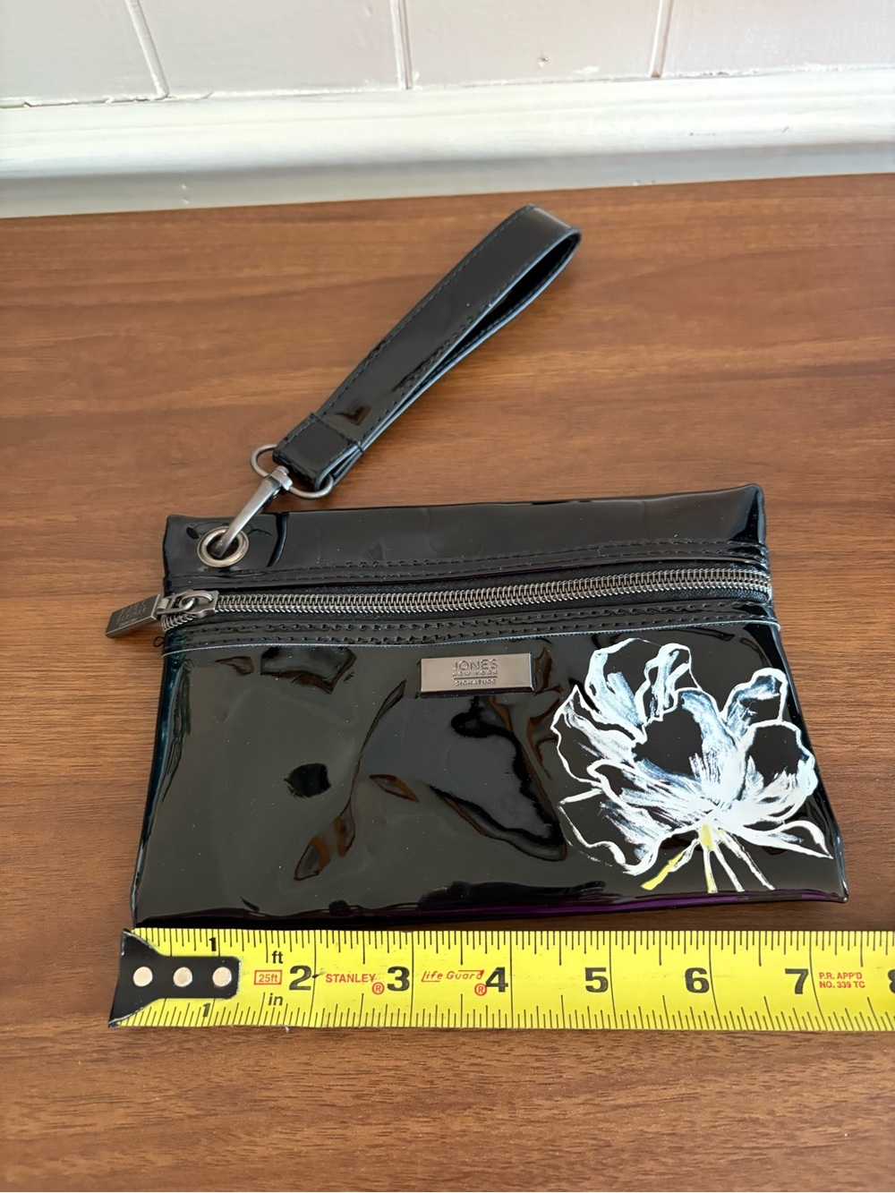 Jones New York Black Patent Wristlet with White Floral Accent
